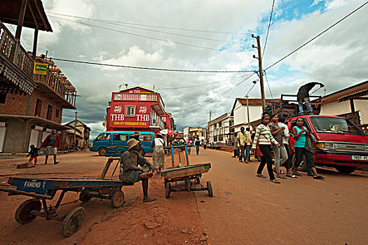 madagascar,ambalavao,street,scene,in,front,of,house,with,local,brewery,advertisement,thb