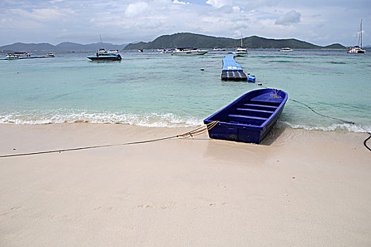 热带海岛海洋海岸沙滩船的背景图片