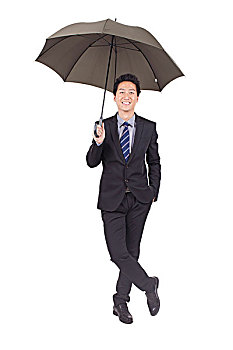 一个手拿黑色雨伞的青年商务男士