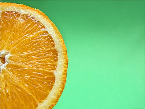 橘子片,微距,绿色背景