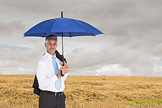 商务人士,拿着,蓝色,伞