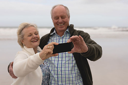 高兴,老年,夫妻,手机,海滩