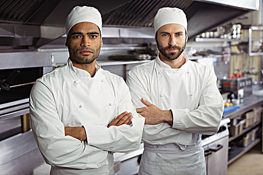 头像,两个,厨师,站立,一起,双臂交叉,商用厨房,餐馆
