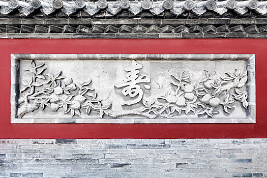 山东省枣庄市台儿庄古城内的砖雕庙墙