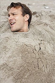 男人,掩埋,沙子,海滩
