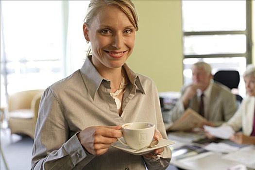 职业女性,30-40岁,咖啡杯