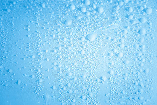 冰爽清凉的白蓝色水滴和冰珠背景图片