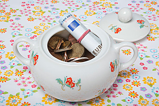 糖罐,欧元硬币,纸币