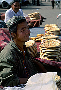 中国,新疆,吐鲁番,市场一景,男孩,销售,面包