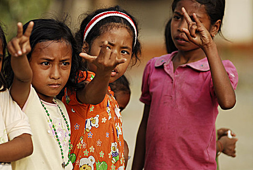 profile,of,singaporean,women,with,unicef,cap,tongue,out