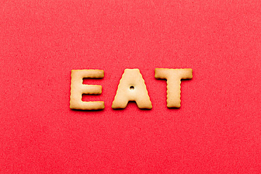 文字,吃,饼干,上方,红色背景