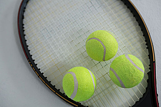 特写,荧光,黄色,网球,球拍,白色背景
