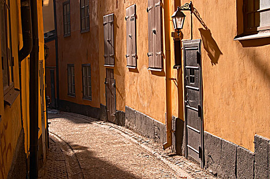 鹅卵石,街道,格姆拉斯坦,铁,老,灯,长,影子,赤陶,墙壁,斯德哥尔摩,瑞典