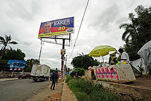 haiti,port,au,prince,billboard,with,presidential,candidate,charles,henri,baker