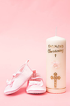 洗礼仪式,蜡烛,粉色,婴儿鞋,粉色背景