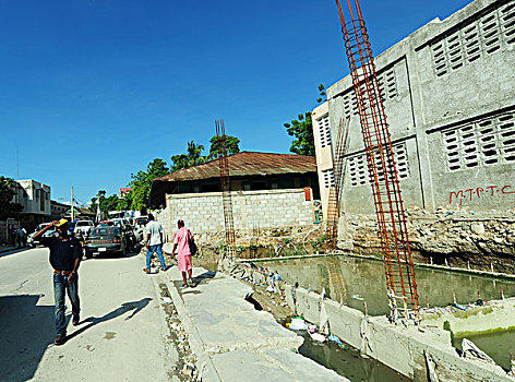 haiti,port,au,prince,contaminated,water,in,front,of,construction,building