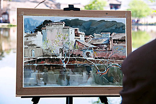 画板中的宏村古建筑群及水中的倒影