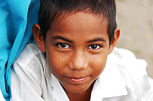 tuvalu,funafuti,close-up,portrait,of,a,smiling,boy,in,school,uniform