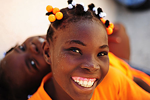 haiti,port,au,prince,portrait,of,schoolgirl,with,braids