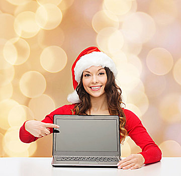 圣诞节,休假,科技,广告,人,概念,微笑,女人,圣诞老人,帽子,手指,留白,笔记本电脑,显示屏,上方,米色,背景
