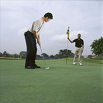 两个男人,玩,高尔夫