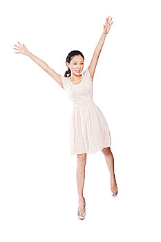 young,woman,standing,with,arms,stretched