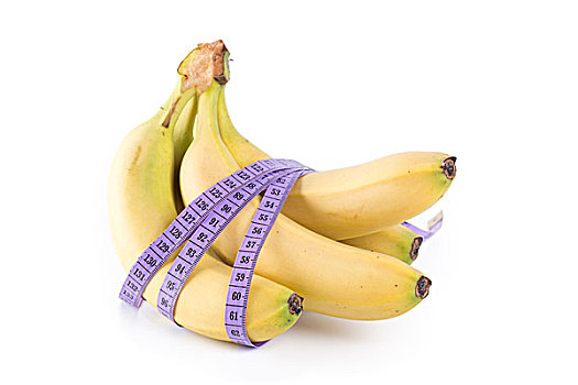香蕉和测量带,健康饮食概念