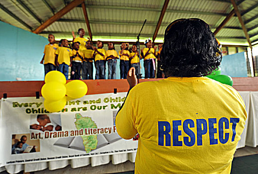 dominica,carib,territory,children,with,a,respect,tshirt,singing,during,school,fair