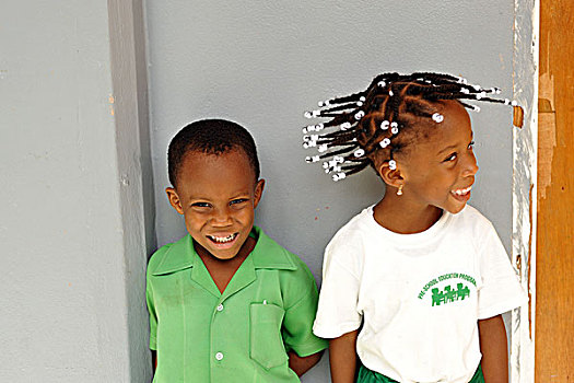 dominica,roseau,preschool,social,center,portrait,of,young,girl,and,boy