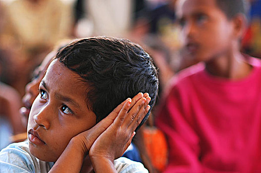 group,of,asian,timorese,children,drinking,water,from,plastic,glass