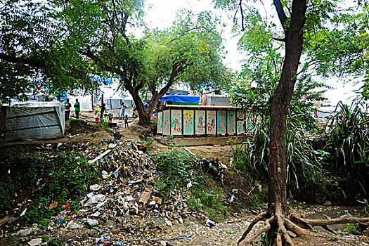 haiti,port,au,prince,petionville,club,camp,toilet,near,contaminated,river