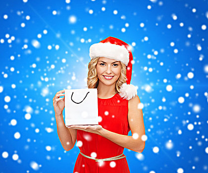 销售,礼物,圣诞节,休假,人,概念,微笑,女人,红裙,圣诞老人,帽子,白色,留白,购物袋,上方,蓝色,背景