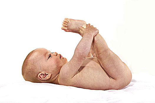 婴儿,男孩,玩,脚,白色背景