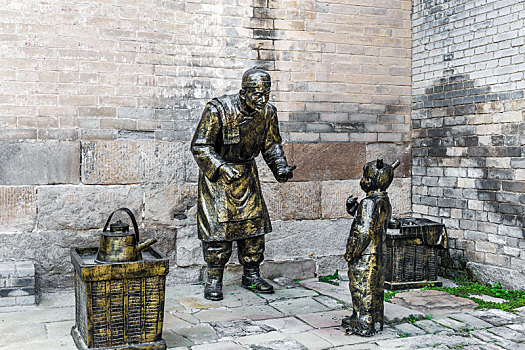 中国山西省晋城郭峪古城街头市井民俗雕塑