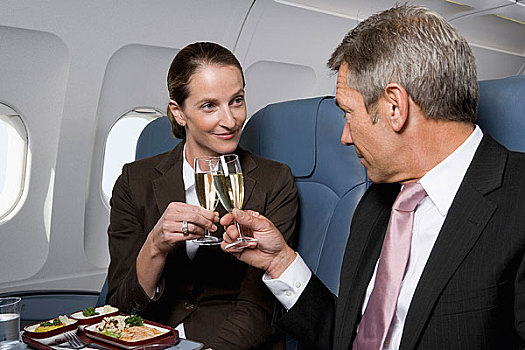商务人士,职业女性,祝酒,香槟酒杯,飞机