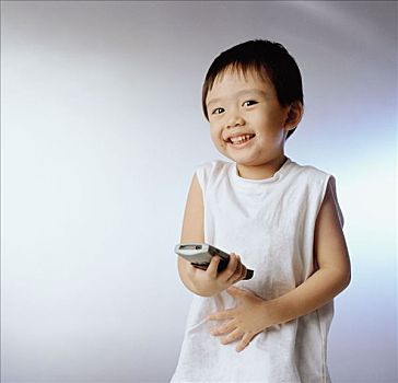 男孩,3岁,拿着,遥控器,微笑