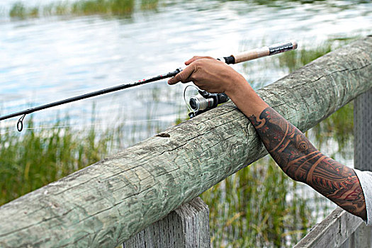 特写,一个人,手臂,拿着,鱼竿,赖丁山国家公园,曼尼托巴,加拿大
