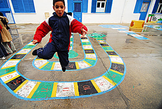 libya,tripoli,children,of,mixed,race,jumping,out,happiness