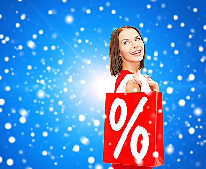 销售,礼物,圣诞节,休假,人,概念,微笑,女人,红裙,购物袋,百分号,上方,蓝色,雪,背景