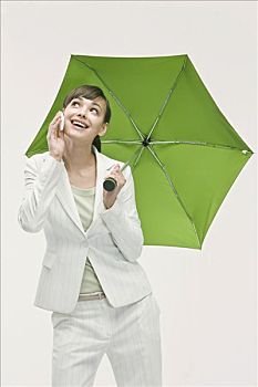 职业女性,打手机,拿着,伞