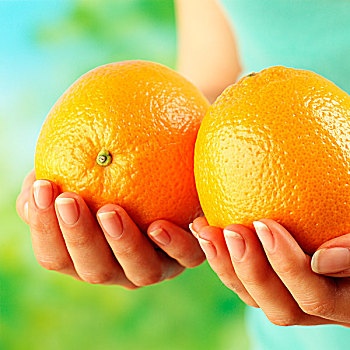 手握橘子头像图片