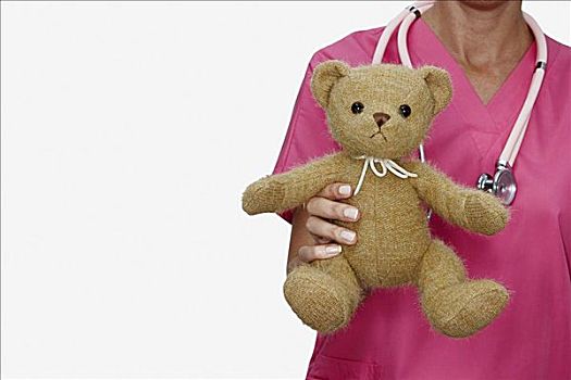 腰部,女护士,拿着,泰迪熊