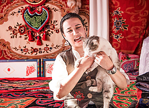 新疆,少数民族,女人,猫