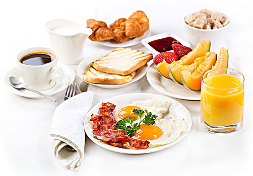 早餐,煎鸡蛋,咖啡,橙汁,牛角面包,水果