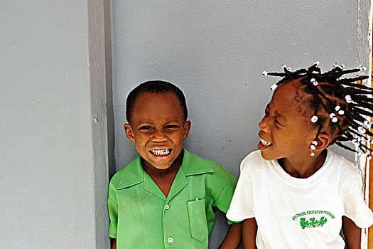 dominica,roseau,preschool,social,center,portrait,of,young,girl,and,boy