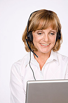 职业女性,耳机,笔记本电脑