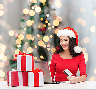 圣诞节,购物,人,概念,微笑,女人,圣诞老人,帽子,礼盒,笔记本电脑,信用卡,上方,树,背景