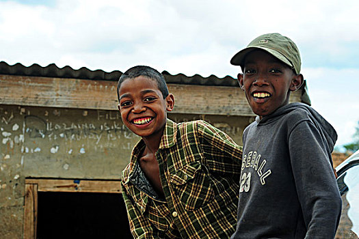 madagascar,fianarantsoa,portrait,of,two,african,boys,smiling
