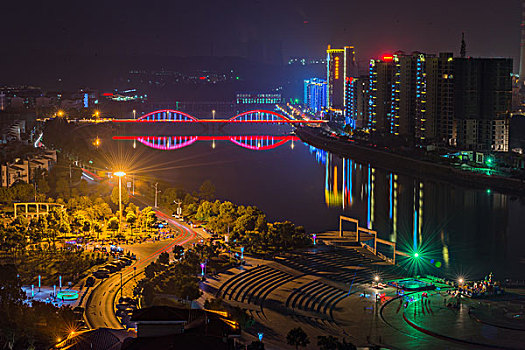 建筑群,高楼,夜景,文化广场,建筑倒影,船,红色的水,轮廓,暗调,晚霞,乌云,霞光,蓝天,白云