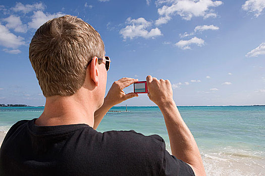 后视图,一个,男人,数码相机,凯布尔海滩,拿骚,巴哈马,加勒比海